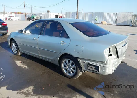 2002 Toyota Camry Xle z USA, uszkodzony, nr VIN JTDBE30K120098696